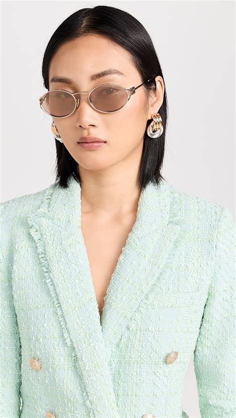 52ys miu miu|Miu Miu™ MU 52YS Oval Sunglasses .